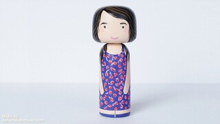 Custom Hand-painted Kokeshi - family portrait.  Itzy Zazzy Inc.