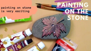 Painting on the stone - acrylic painting