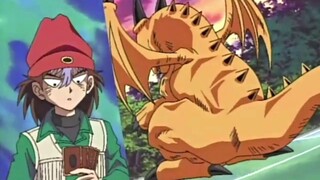 Yu-Gi-Oh! 09: Jonouchi ghen tị với Ryuzaki và trở thành người hầu của Peacock Mai, đồng thời lấy đượ