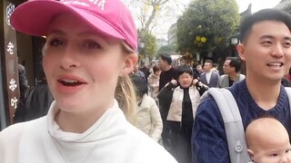 My American wife saw pandas for the first time in Chengdu and was so excited that she forgot to brea