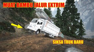 TRUK MUAT BAMBU JALAN TANAH JALUR EXTRIM