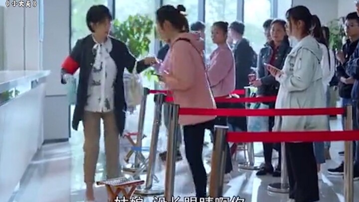 An elderly woman complains that others are cutting in line and lack manners, only to discover she’s 