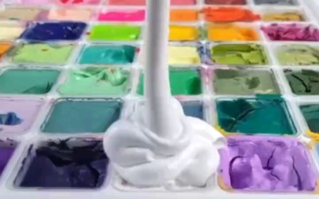 Different art students squeezing paint!