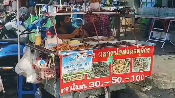 Thai Cuisine: Crispy Fried Bamboo Worms from a Street Stall—Deliciously Fragrant, Crisp, and Mouthwa