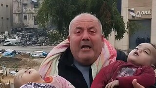 A Palestinian old man holding his living child questioned Biden: What did these children do?