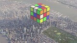 What would it look like if a giant Rubik's Cube fell from the sky over a city? [Atomic Miracle]