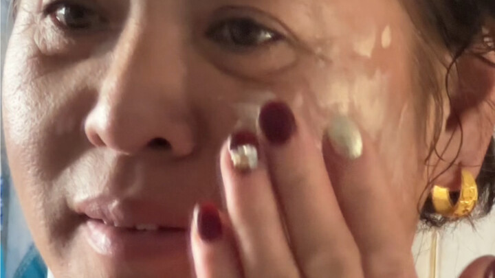 My mom is performing the “chick pecking at rice” base makeup technique for everyone!