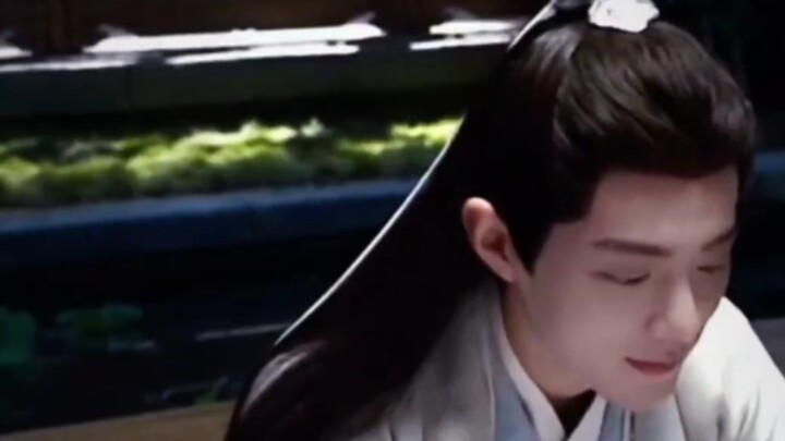 Question: What does Xiaozan mean by this gesture?
