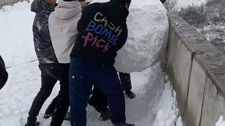 The moment the snowball hits the water is so beautiful!