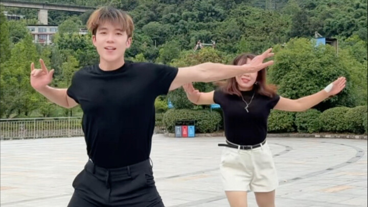 Sister and brother dance
