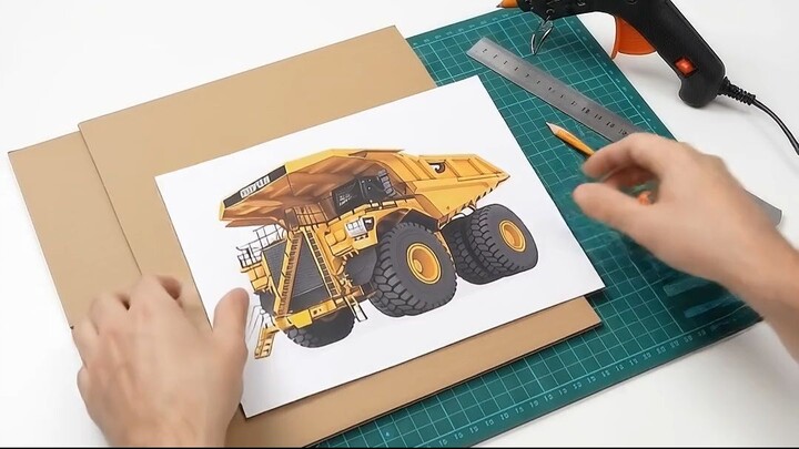 You turn cardboard into a mining truck