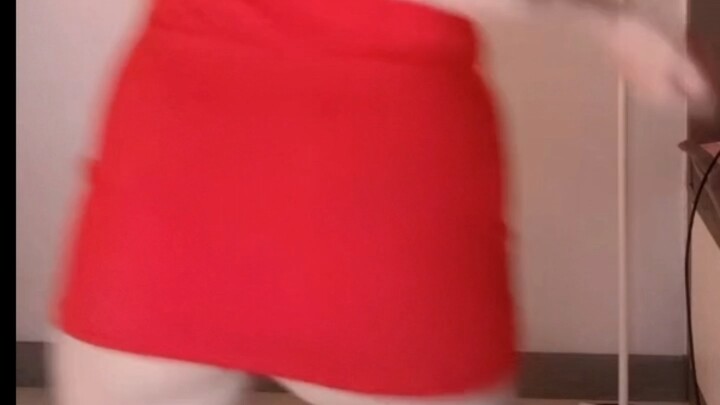 Red Dress Swinging in the Back (Does It Contain Pornography? Must Be Determined)