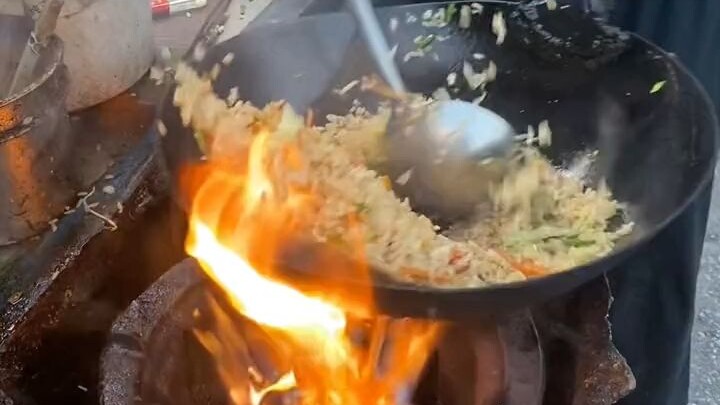 Fried Rice by the Roadside: A Simple Stall, a Common Story.