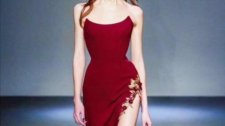 If she hadn't worn this red dress, it might not have had such a stunning effect.
