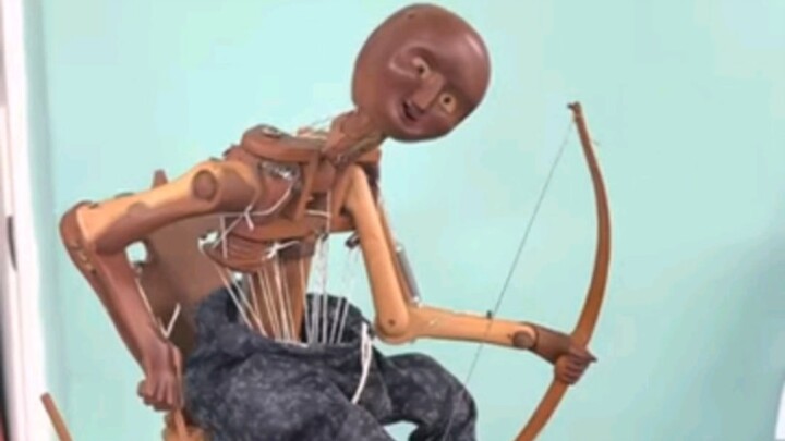 Spooky Antique Mechanical Robot Ornament That Automatically Shoots Arrows