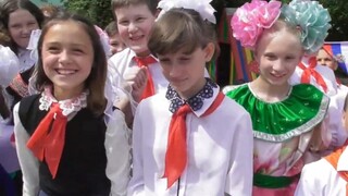 Lugansk children wearing red scarves celebrated International Children's Day on June 1, 2023, and al