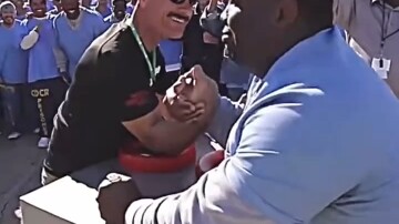 American prison black man vs professional arm wrestling player