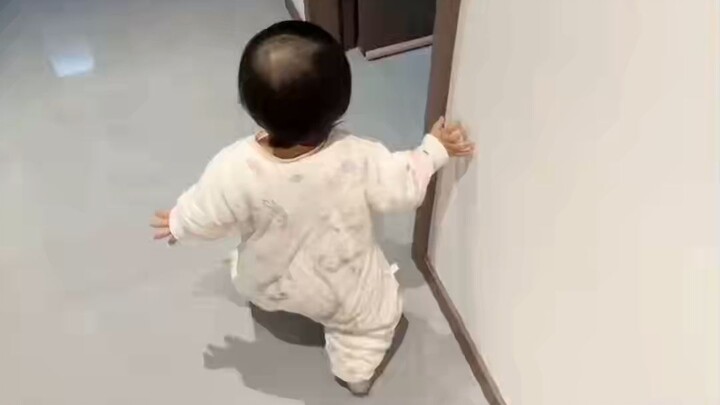 When I handed the new shoes to the baby to try on, she immediately started showing off.