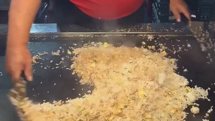 أرز مقلي على الصاج - قلي عشر وجبات مرة واحدة