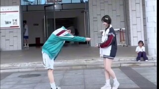 Men and women practice gee dance