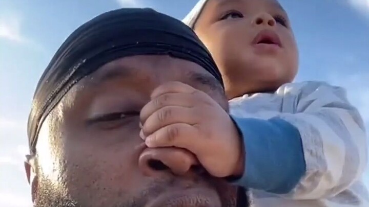 When the kid uses Dad’s big nose as a handle...