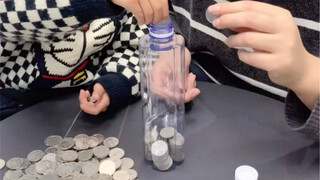 低成本存钱罐，这瓶子真的太能装了，装满刚好405个，五斤二两