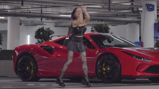 Hot hot girl in London garage with long leather boots three sets of costumes to cover the whole song
