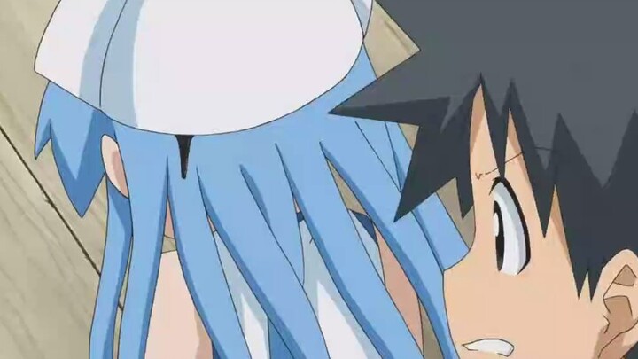 Squid Girl forcefully tugs at her squid hat, only to have ink squirt out instead of blood!
