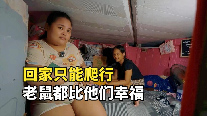 Philippine bridge-under slum: ceiling height less than 1 meter. Their only dream is to stand tall.