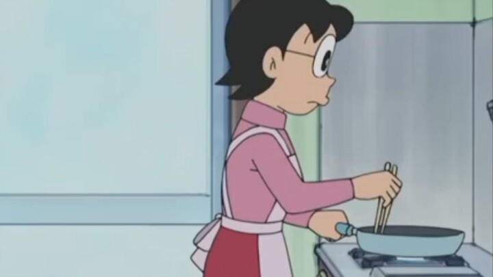 ibu nobita sedang makan