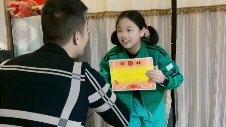 This honor was hard-earned; Dad has to present the award himself.