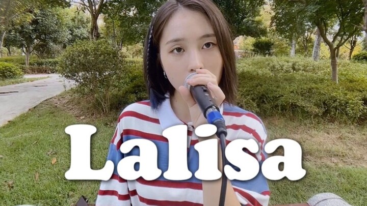 A girl is singing Lisa's "LALISA" in the garden