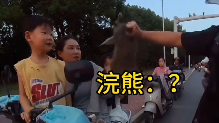 Not saying a word, just endlessly pulling things out to give to others.