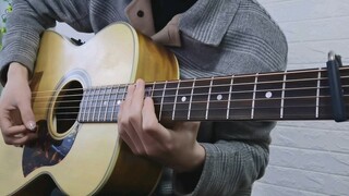 Lagu "Astronomia" di-cover oleh seorang laki-laki dengan gitar