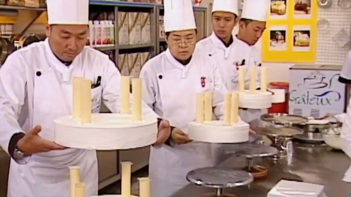 Turns out the fancy top tiers of a tiered cake are just for show—only the bottom layer is actually e