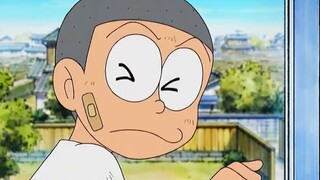 Doraemon: Nobita và Doraemon quay về quá khứ để hái hồng nhưng bị cha nhầm là kẻ trộm