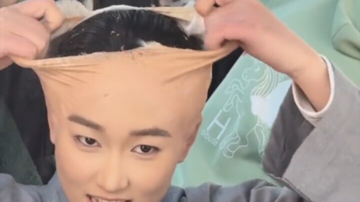 Xé da đầu bằng tay không
