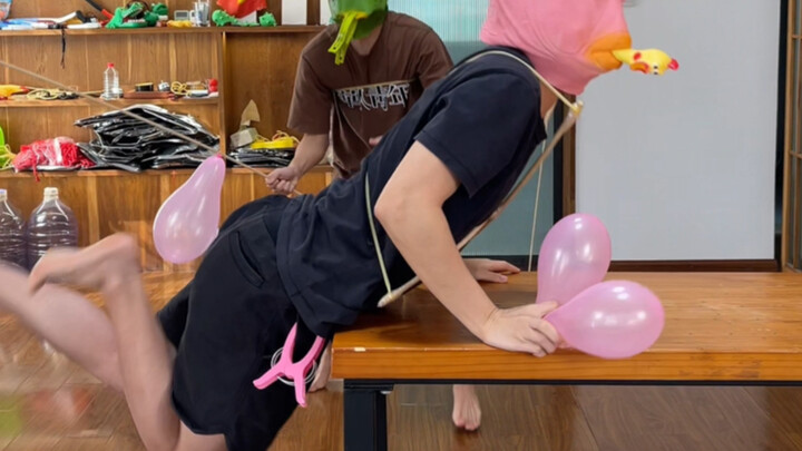 Hurry up and call your friends to watch the blindfolded balloon-popping challenge!