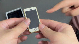 没想到这迷你手机居然是个打火机