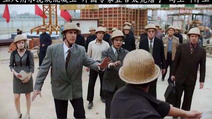 Workers pour water over the concrete—foreigners watching can’t believe how absurd it is!