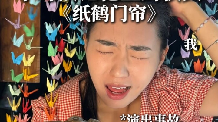 Paper cranes spin gently, like childhood whispers left unfinished.