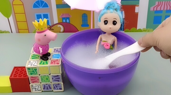 A toy story, it's too dangerous for George to go swimming. The mermaid came over to help catch Georg