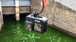 Dropping a GoPro into a DEEP Spillway!!! (GIANT Fish Everywhere!)