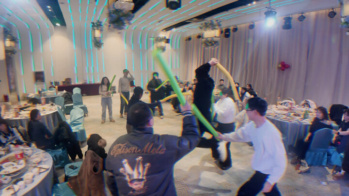 First, a little hype for the annual party! Q: How many people in the video are beating up the dean?