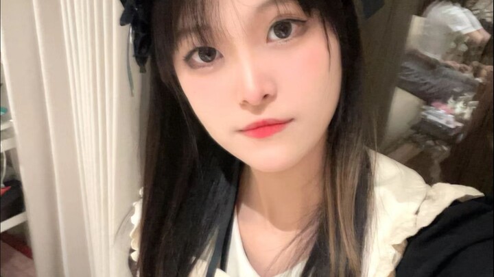 Wearing a maid outfit to perform