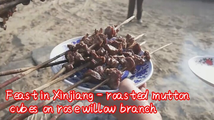 Feast in Xinjiang - roasted mutton cubes on rose willow branch
