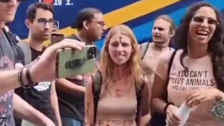 American man eating meat skewers on the street is besieged by vegans, and he fights back in a desper