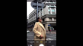 Taking photos of a passerby auntie