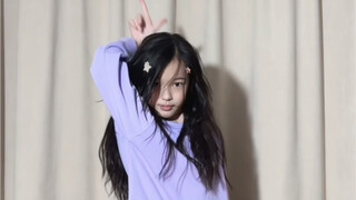 Primary school students danced the "Money" dance in two sets of costumes