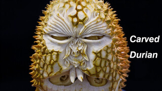 Carving in the shell and meat of a durian